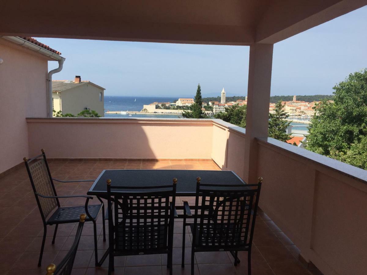 Apartment And Rooms Milak Rab Town Exterior photo